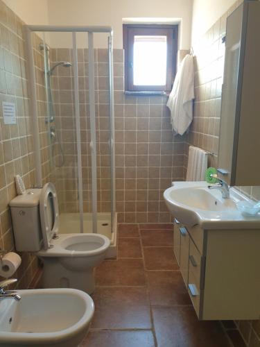 Koupelna v ubytování Agriturismo Diaccialone