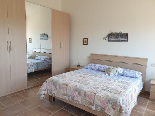 Ένα ή περισσότερα κρεβάτια σε δωμάτιο στο Agriturismo Diaccialone