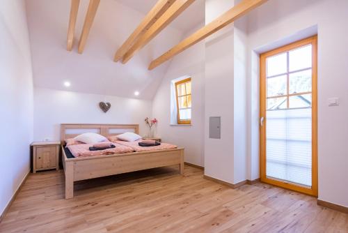 Postel nebo postele na pokoji v ubytování Holiday house Zupanc
