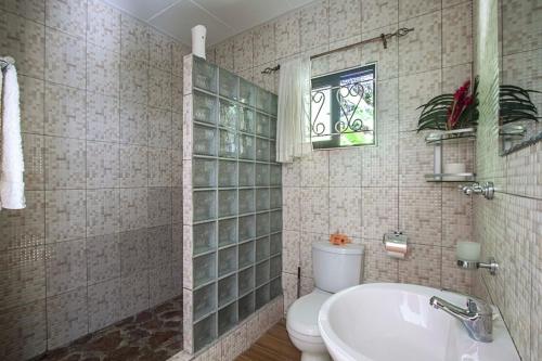 Ванная комната в Tannette Villa