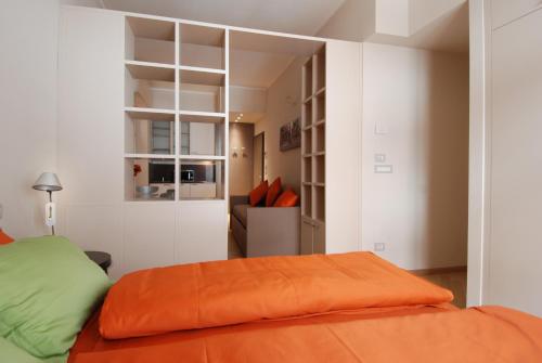 En eller flere senge i et værelse på UR-NEST Piazza Maggiore