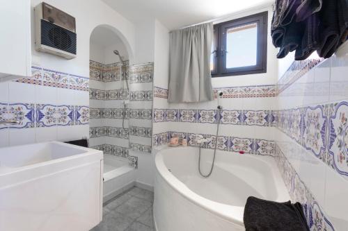 Koupelna v ubytování Hôtel Les Alizés