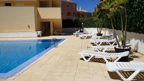The swimming pool at or near Marina Vilamoura Apartment