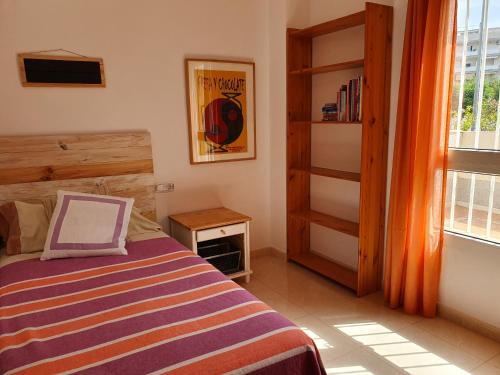 Posteľ alebo postele v izbe v ubytovaní Fantastico bajo con Jardin en Playa de Canet