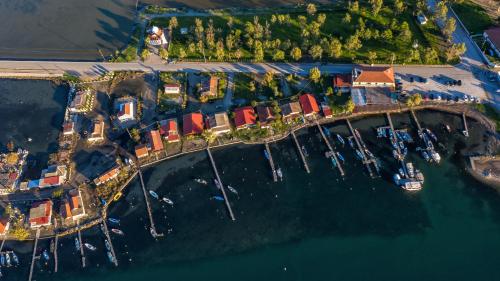 an aerial view of a marina with boats in the water at Island Apartments in Mesolongion