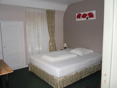 Postel nebo postele na pokoji v ubytování Hotel Malcot