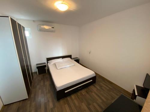 Postel nebo postele na pokoji v ubytování Casa Ciobi