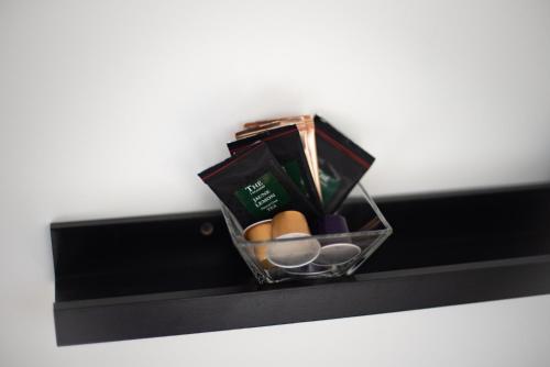 a basket of eggs on a shelf in a room at Les Chambres du Verger in Amiens