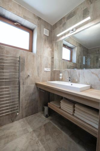 Ein Badezimmer in der Unterkunft Rezidence Tři Studně