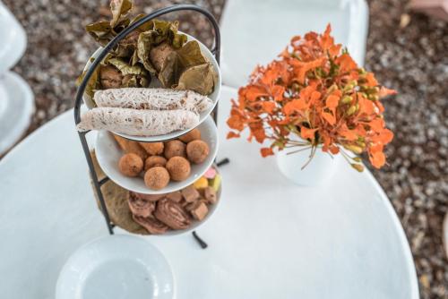 a plate of food on top of a table at Tranquil Wild in Tanamalwila