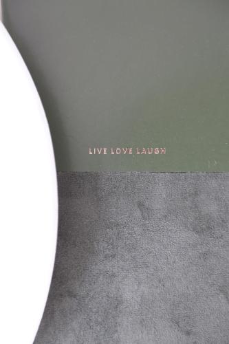 a sign that says live love laugh on a wall at Kleine 25 in Solingen