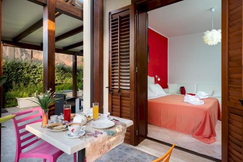 Ένα ή περισσότερα κρεβάτια σε δωμάτιο στο B&B Armonie