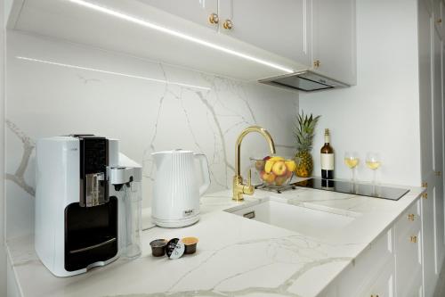 Η κουζίνα ή μικρή κουζίνα στο Luxury Del Sol Apartments Świnoujście