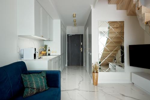 Μια τηλεόραση ή/και κέντρο ψυχαγωγίας στο Luxury Del Sol Apartments Świnoujście