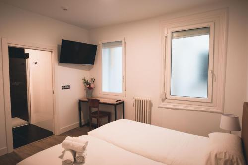 Postel nebo postele na pokoji v ubytování Central Roomss