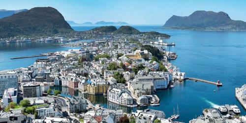 an aerial view of a city on the water at Irenegarden - Fjord view holiday home in Lauvstad