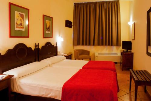 Cama o camas de una habitación en Hotel Telecabina