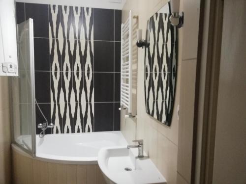 Et badeværelse på apartament eurotrader321