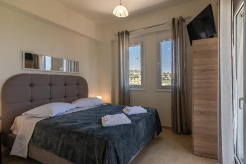 Postel nebo postele na pokoji v ubytování Haravgi 5 bedrooms villa