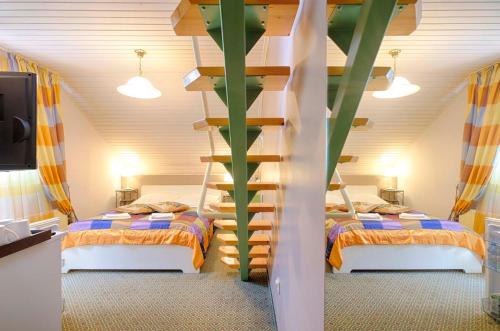 Llit o llits en una habitació de Penzion Park