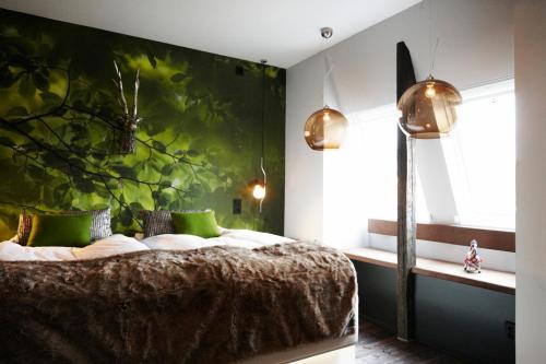 Llit o llits en una habitació de Huskvarna Stadshotell