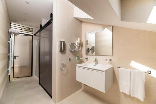 Vonios kambarys apgyvendinimo įstaigoje BO Hotel Palazzo