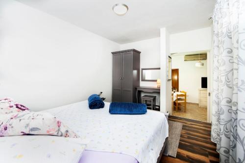 Posteľ alebo postele v izbe v ubytovaní Apartments Karmen