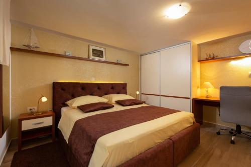 Posteľ alebo postele v izbe v ubytovaní Studio apartment Oleander