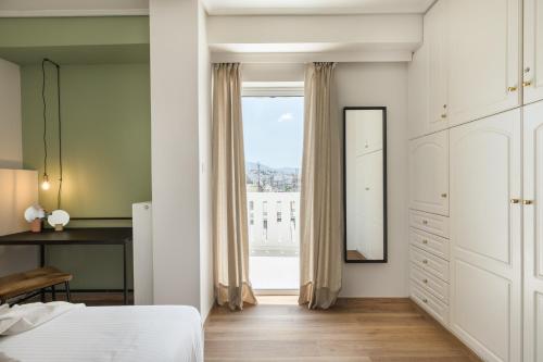 Iconic 1BR Apartment in Koukaki by UPSTREET