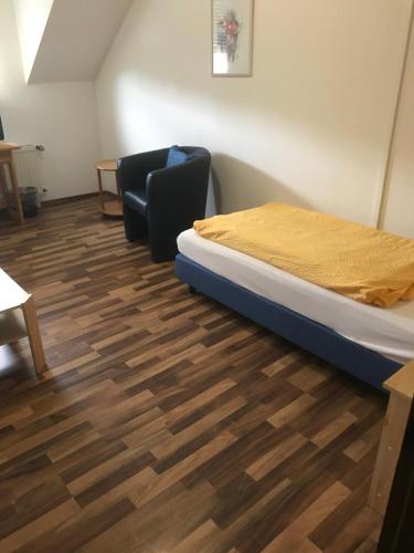 Postel nebo postele na pokoji v ubytování Hotel Kaufmann