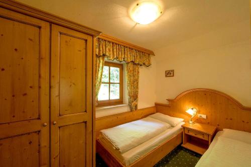 Una cama o camas en una habitación de Leithäusl