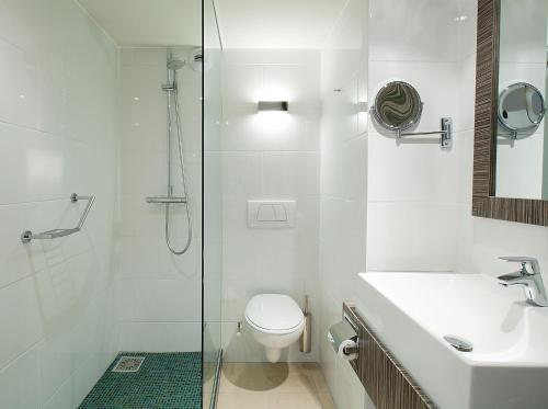Een badkamer bij Carlton Beach