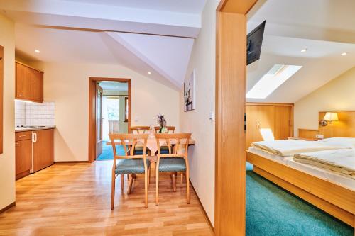 Postel nebo postele na pokoji v ubytování City Appartementhotel