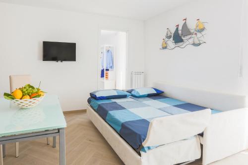 Posteľ alebo postele v izbe v ubytovaní SeaView Sorrento Apartment by the sea with terrace