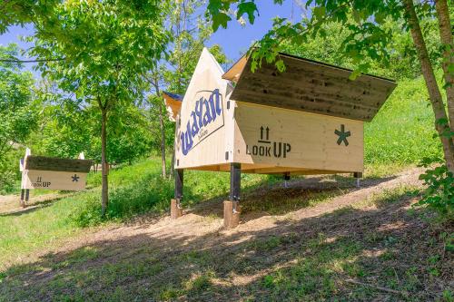 a sign for a park with a boat on it at Casa Baladin camere di Charme e Agronidi dell'Open Garden in Piozzo