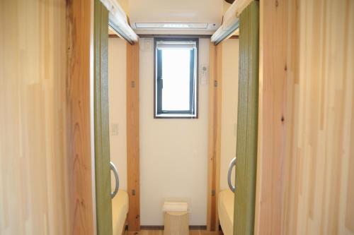 Ένα μπάνιο στο Guest house kusunoki（women only）