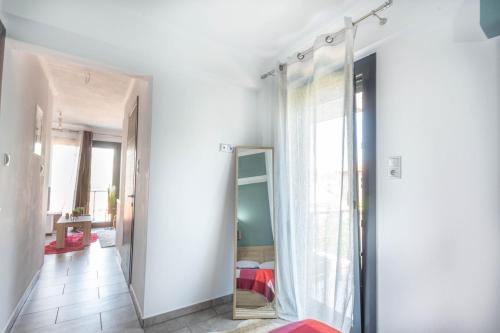 Postel nebo postele na pokoji v ubytování DNS Apartment