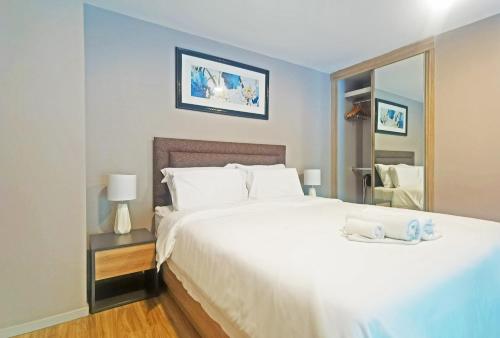 Krevet ili kreveti u jedinici u objektu Blossom Sathorn Hospitality （曼谷高端酒店公寓）