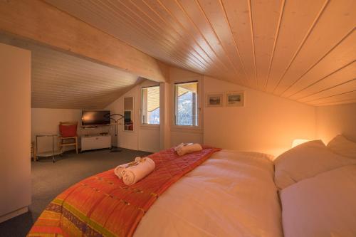 Chalet Primula Penthouseにあるベッド