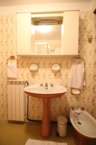 Phòng tắm tại Trilocale in Centro La Marmotta - Affitti Brevi Italia