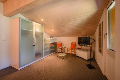 Chalet Primula Penthouseにあるテレビまたはエンターテインメントセンター