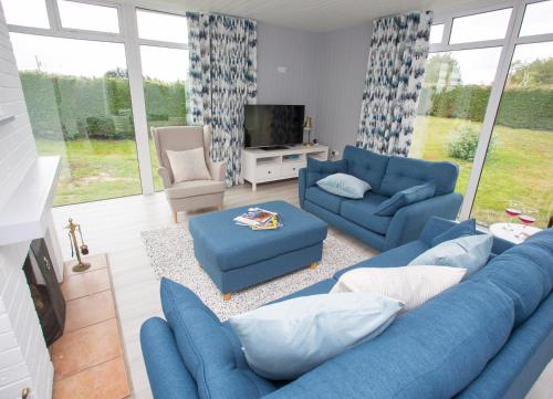 A seating area at Cornagower East Brittas Bay by Trident Holiday Homes