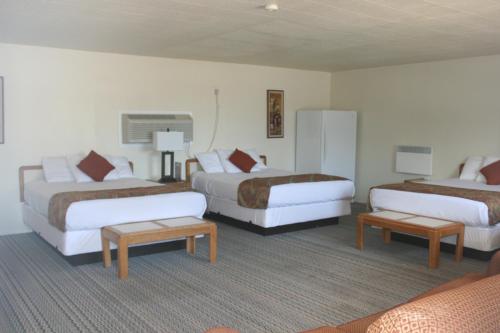 Un pat sau paturi într-o cameră la Bryce Zion Inn