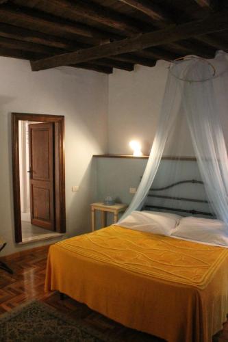 Кровать или кровати в номере Ospitalità Collicola