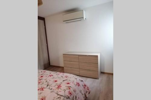 Postel nebo postele na pokoji v ubytování CHARMANT APPARTEMENT AVEC TERRASSE