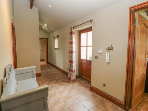 a hallway of a home with a door and a room at Ellaberry in Darlington