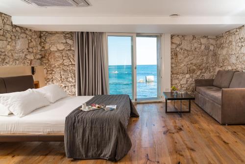 Posteľ alebo postele v izbe v ubytovaní Re Dionisio Luxury Suites