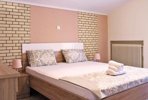 Ліжко або ліжка в номері SAPPHIRE & IVORY Luxury Apartments - Kavala