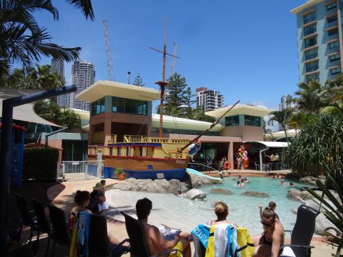a group of people in a pool at a resort at Crown Towers in Gold Coast