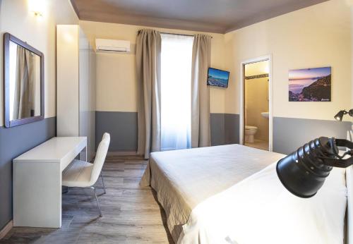 Albergo La Villettaにあるベッド